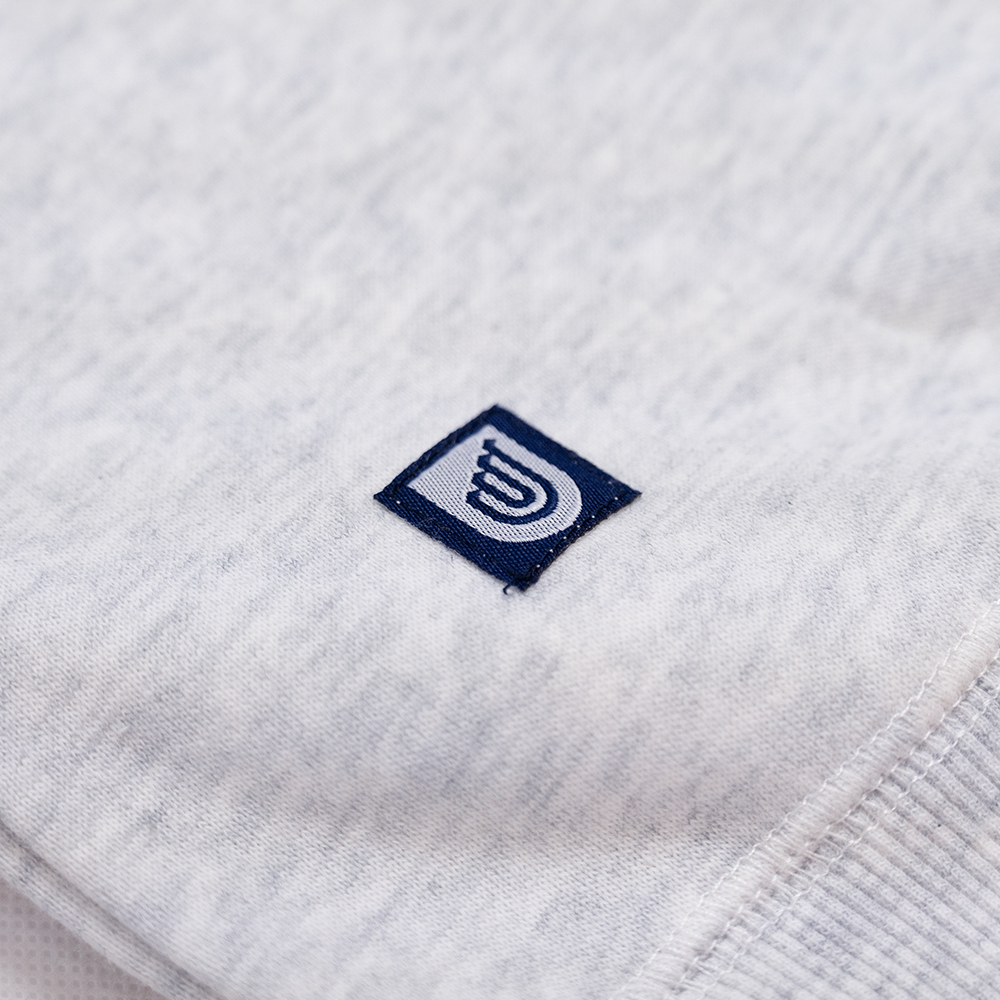 Crew Neck Jumper in White Marle- Traditional Logo