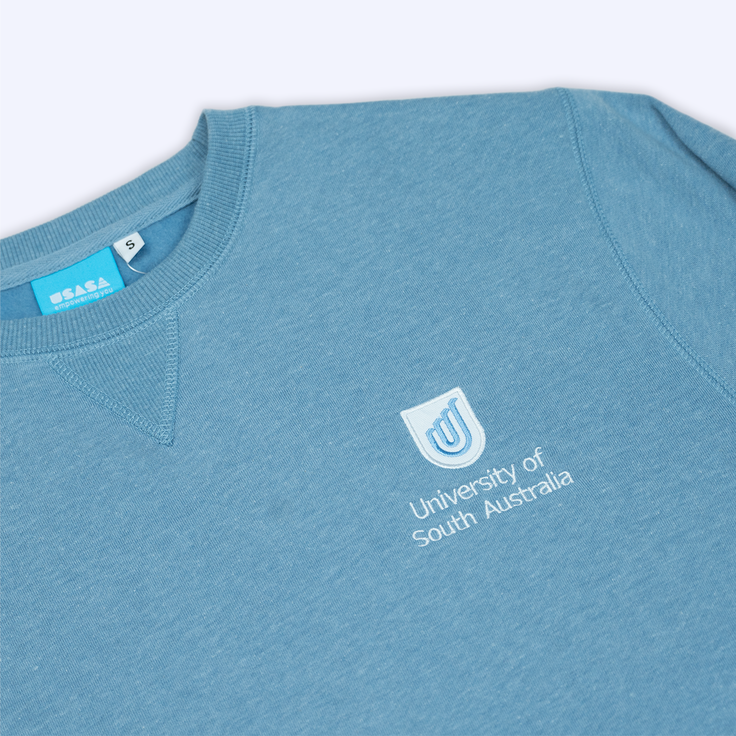 Crew Neck Jumper in Sky Blue- Traditional Logo