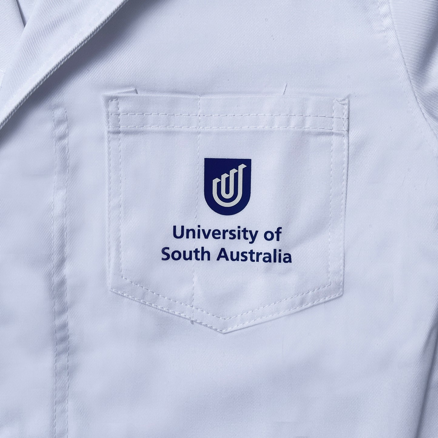 Lab Coat with UniSA logo